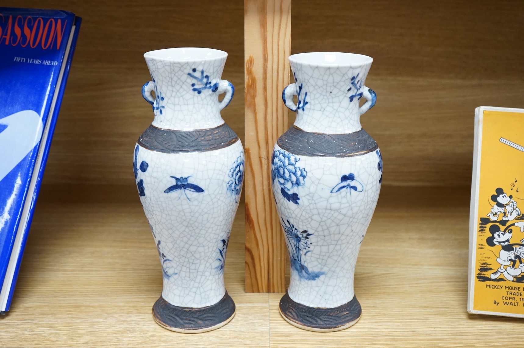 A pair of Chinese blue and white crackleware baluster vases, early 20th century, 26cm high